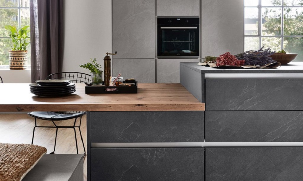 Nobilia Stoneart kitchen detail with stone-effect fronts and a warm wooden accent