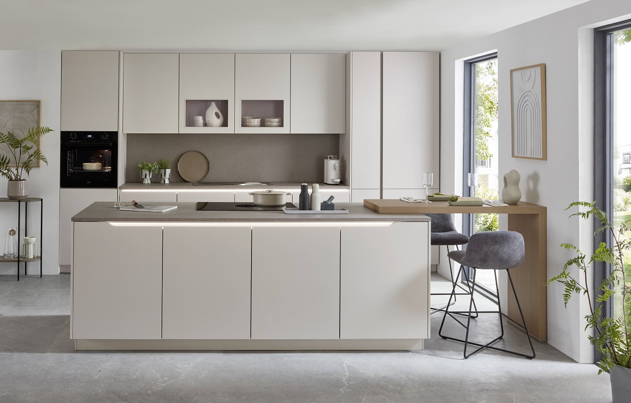 Handleless Easytouch kitchen in a dark red shade with an island